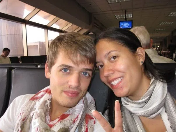 Adam and Rachelle Poffenberger smiling together while traveling in China