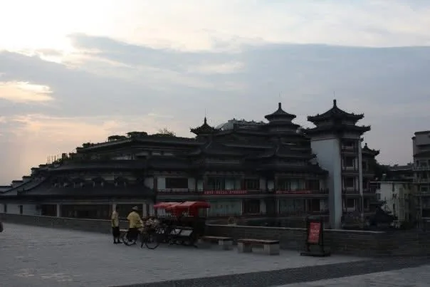 Traditional tiered rooftops on the Xi'an city wall at dusk